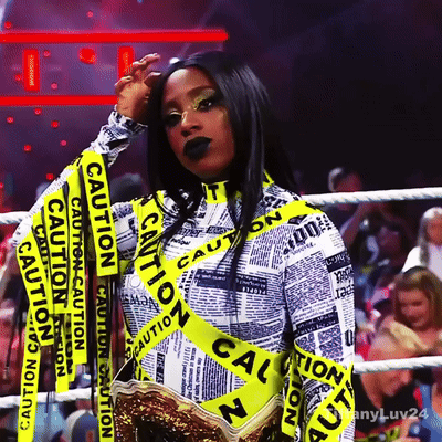 Woman in Boxing Ring With Caution Tape