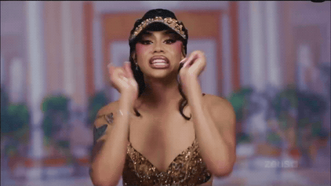 Woman In Bra And Hat Thumbs Up GIF