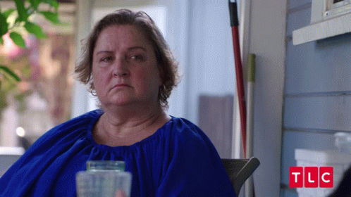 Woman In Brown Shirt Smiling Saying I Make A Slammin PB And J GIF