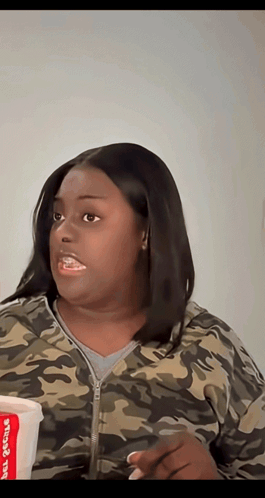Woman In Camouflage Jacket Holding Chicken Cup GIF