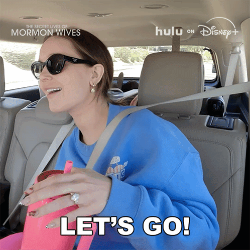 Woman in Car Saying Lets Go