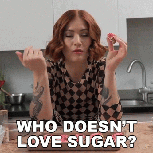Woman in Checkered Shirt Saying Who Doesn't Love Sugar