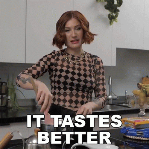 Woman in Checkered Top Cooking It Tastes Better