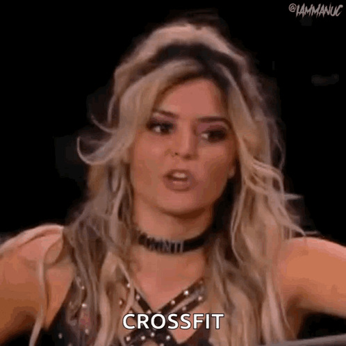 Woman in Choker and Black Top Saying Crossfit