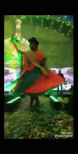Woman In Colorful Dress Dancing Made With Vivavideo GIF