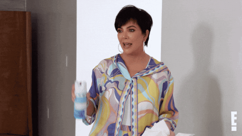 Woman In Colorful Shirt Standing GIF