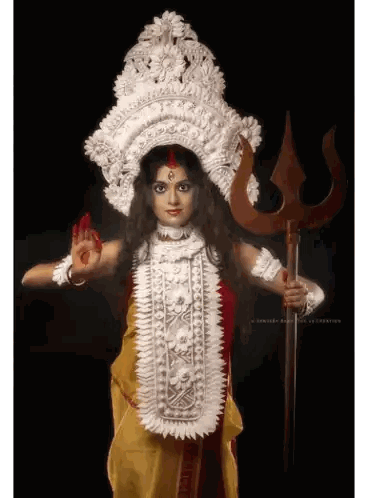 Woman in Costume Holding Trident