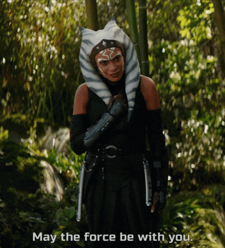 Woman in Costume Saying May The Force Be With You