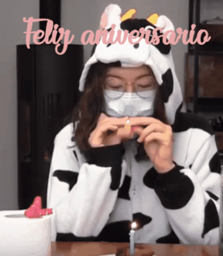 Woman In Cow Costume With Mask GIF
