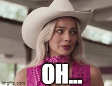 Woman in Cowboy Hat and Bandana Saying Oh