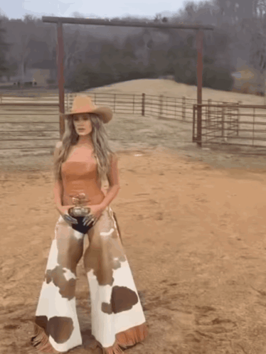 Woman in Cowboy Hat and Chaps
