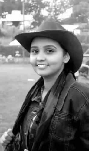 Woman in Cowboy Hat and Jacket