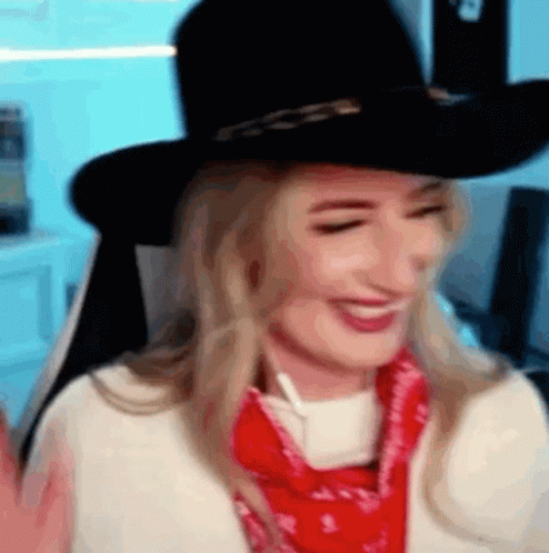 Woman in Cowboy Hat and Red Bandana Smiling