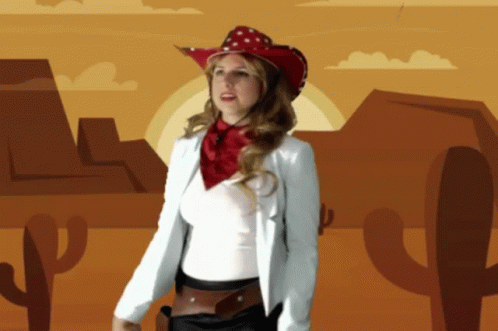 Woman in Cowboy Hat and Scarf in Desert