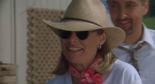 Woman in Cowboy Hat and Sunglasses Saying I Saw You On