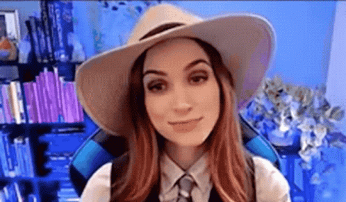 Woman In Cowboy Hat And Tie Smiling GIF