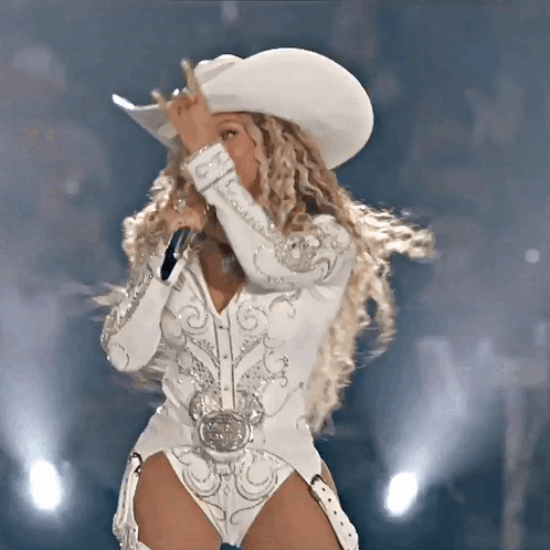 Woman in Cowboy Hat Singing