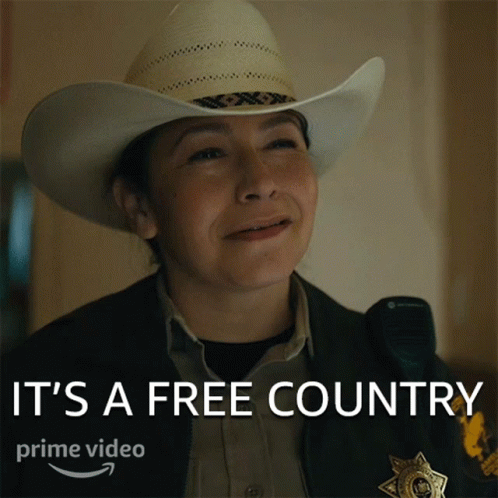 Woman in Cowboy Hat Smiling It's a Free Country