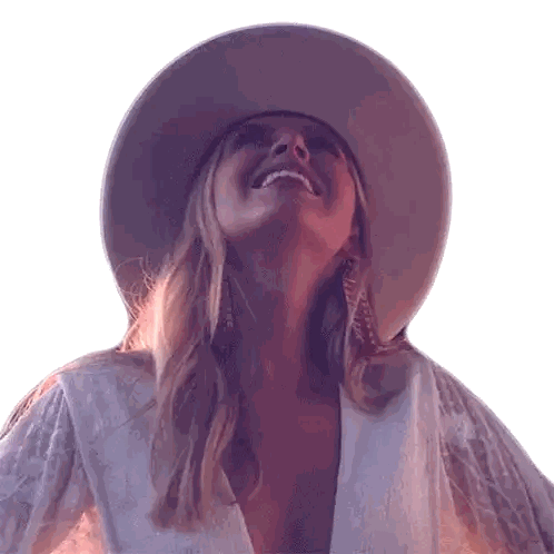 Woman in Cowboy Hat Smiling Up