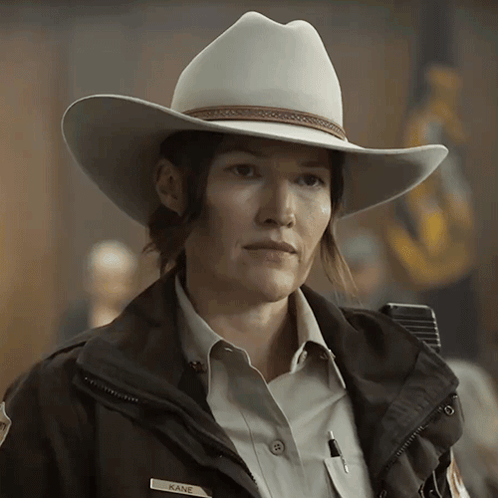 Woman In Cowboy Hat With Kane On Jacket GIF