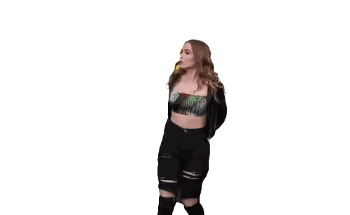 Woman in Crop Top and Black Jeans Dancing