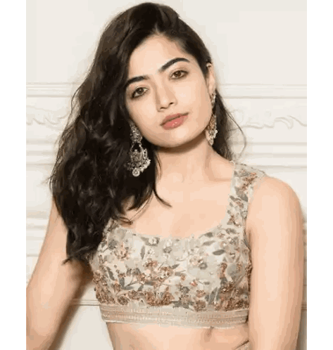Woman in Crop Top and Earrings