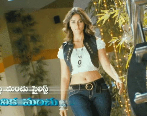 Woman In Crop Top And Jeans Before Telugu Sign GIF