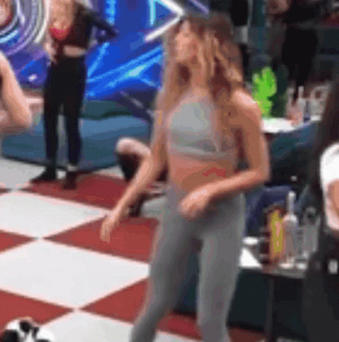 Woman in Crop Top and Leggings