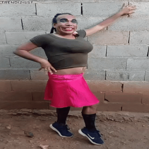 Woman in Crop Top and Pink Skirt Arms Out