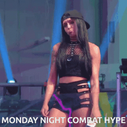 Woman in Crop Top and Shorts Monday Night Combat Hype
