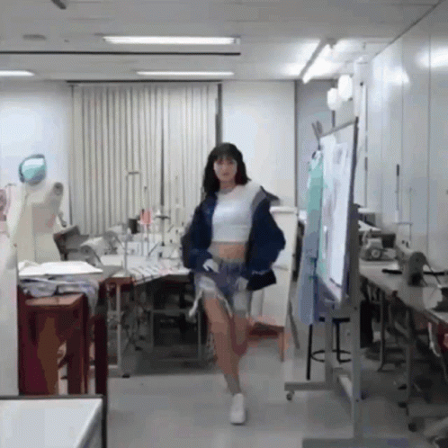 Woman In Crop Top And Shorts Walking GIF