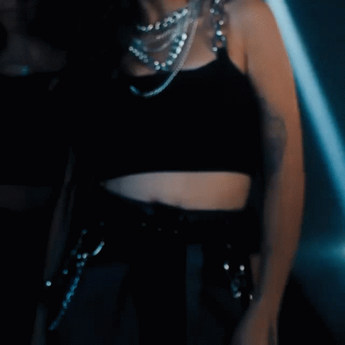 Woman in Crop Top Surrounded by Women