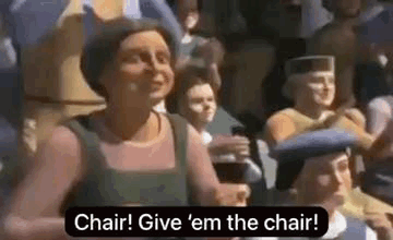 Woman in Crowd Saying Chair Give Em the Chair