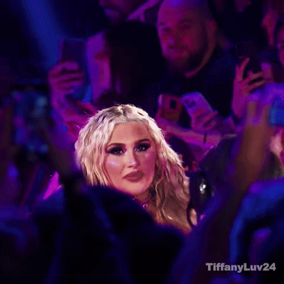 Woman in Crowd with Purple Lights Tiffany Luv24