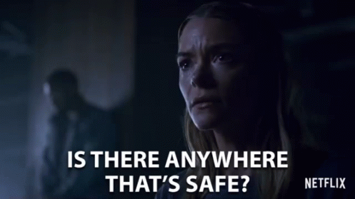 Woman In Dark Room Asking If Anywhere Safe GIF