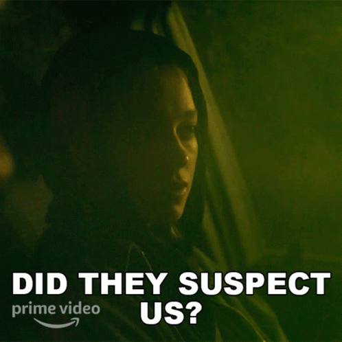 Woman in Dark Room Did They Suspect Us