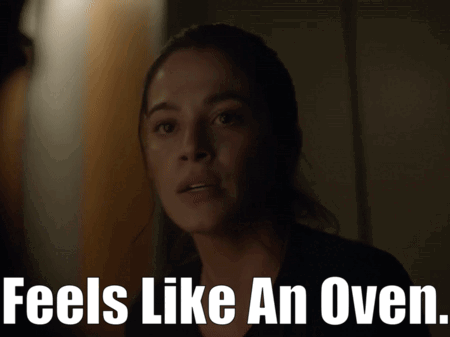 Woman in Dark Room Feels Like Oven