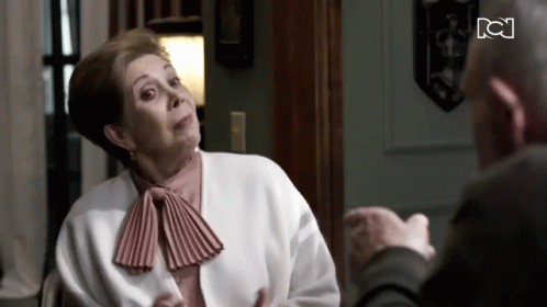Woman In Dark Room Mouth Open Actua Como Tal GIF