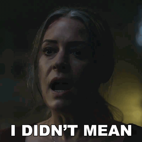 Woman in Dark Room Saying I Didn't Mean