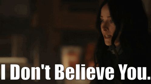 Woman in Dark Room Saying I Don't Believe You