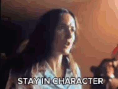 Woman in Dark Room Saying Stay in Character