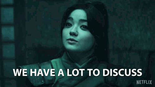Woman in Dark Room Saying We Have a Lot to Discuss
