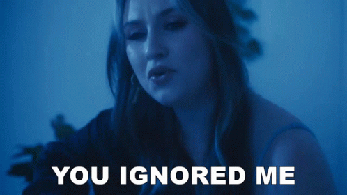 Woman in Dark Room Saying You Ignored Me