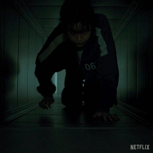 Woman in Dark Room With Netflix
