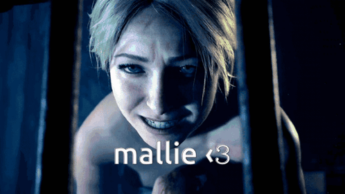 Woman In Dark Room With Text Mallie <3 GIF