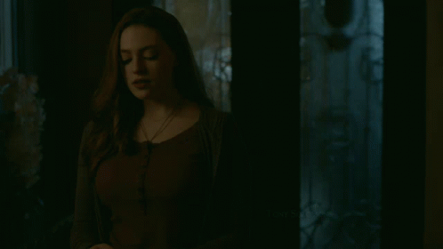 Woman In Dark Room With Tony Solomons GIF