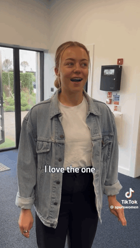 Woman in Denim Jacket and White Shirt Says I Love The One