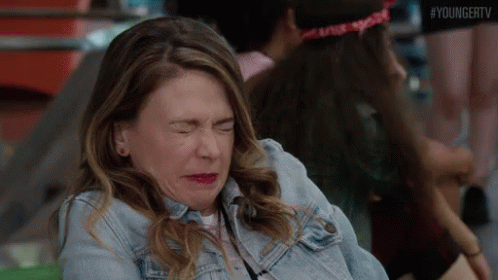 Woman In Denim Jacket Crying GIF