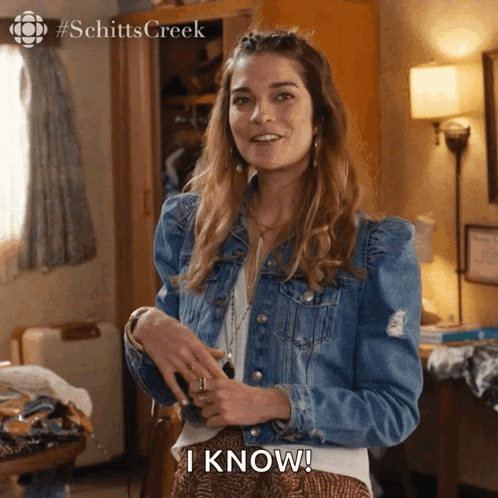 Woman in Denim Jacket Saying I Know