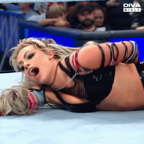 Woman in Diva Bible Wrestling Match